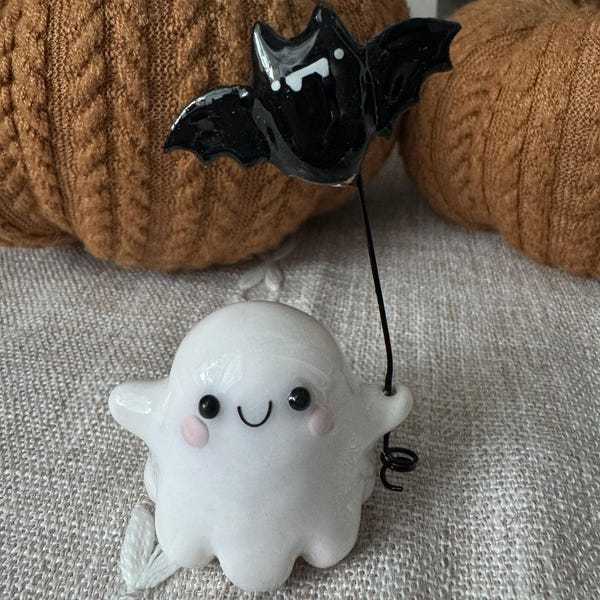 Ghost with Bat Balloon Figurine