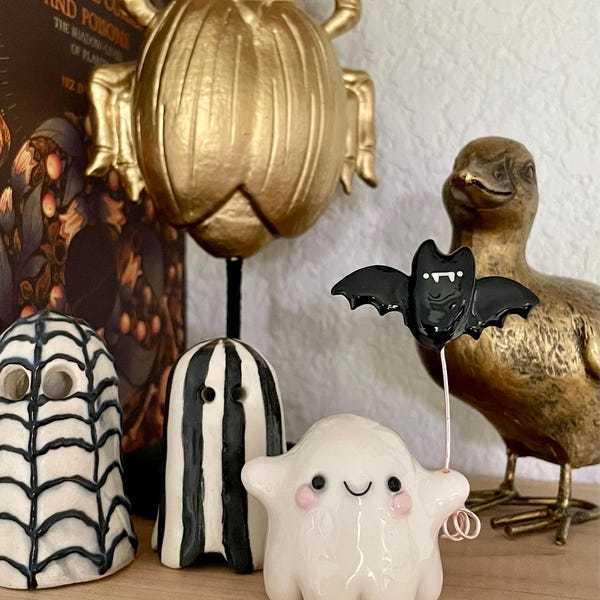 Ghost with Bat Balloon Figurine