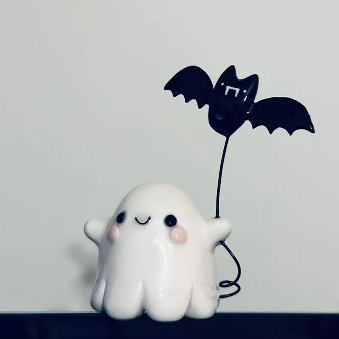 Ghost with Bat Balloon Figurine