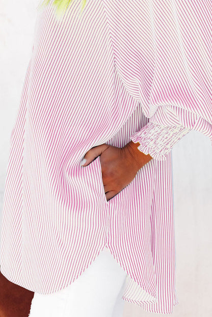 Mid-length shirt with striped lapel and oversized drawdown sleeves