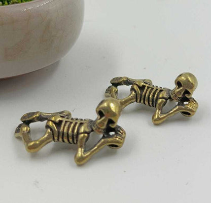 ☠️🔥Mysterious Charm☠️ - Mini Brass Skull Figurine
